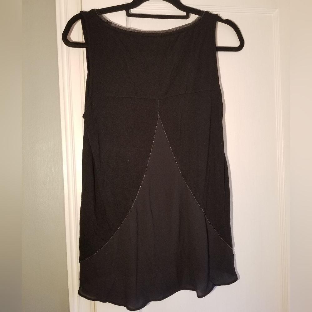 Beautiful, elegant blouse with tiny gems lining a sheer back panel